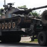 “El Secreto detrás de la Leyenda: Descubriendo a los Intérpretes que Hacen Vibrar el Clásico ‘¿Quién Canta los Peces en el Río?'”.